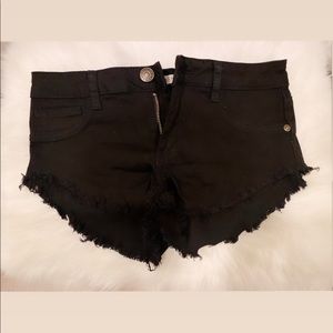Black distressed shorts